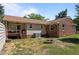 Spacious backyard featuring a fire pit and a covered deck with stairs to yard at 2719 S Nc 87, Graham, NC 27253