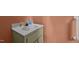 Bathroom vanity features a white countertop and beige painted cabinets at 2719 S Nc 87, Graham, NC 27253