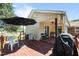 Outdoor living space with a covered deck, seating, and a barbecue grill at 2719 S Nc 87, Graham, NC 27253