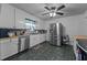 Bright kitchen featuring updated stainless appliances and a window over the sink at 2719 S Nc 87, Graham, NC 27253