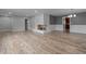 Spacious living area with brick fireplace and recessed lighting at 305 W Old Rd, Lillington, NC 27546