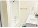 Bright bathroom featuring dual sinks, a shower/tub combo, and sleek design at 3141 Wagoner Ln # 09, Graham, NC 27253