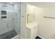 Elegant bathroom featuring a glass-enclosed shower with marble tile and a modern vanity at 3141 Wagoner Ln # 09, Graham, NC 27253