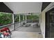Large covered deck with ceiling fans and plenty of seating for relaxation and outdoor activities at 3141 Wagoner Ln # 09, Graham, NC 27253