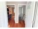 Inviting entryway featuring wood floors, white trim, and easy access to the living room and staircase at 3141 Wagoner Ln # 09, Graham, NC 27253