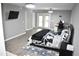 Large main bedroom with french doors to the outside, a king bed, and a workspace at 3141 Wagoner Ln # 09, Graham, NC 27253