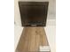 Interior design choices featuring dark wood cabinet and wood look flooring at 331 Chesapeake Cmns St # 106, Garner, NC 27529
