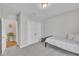 Cozy bedroom features neutral walls, plush carpeting, and a closet at 3313 Brunot St, New Hill, NC 27562