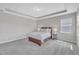Spacious main bedroom featuring natural lighting, and tray ceiling at 3313 Brunot St, New Hill, NC 27562