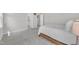 Neutral main bedroom features light gray carpet with views to bathroom at 3313 Brunot St, New Hill, NC 27562