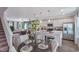 Open-concept dining area and kitchen with a view to the living room, perfect for entertaining at 366 Bunker Hill Place, Angier, NC 27501