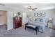 Spacious main bedroom boasts a plush bed, soft lighting, and a ceiling fan for added comfort at 366 Bunker Hill Place, Angier, NC 27501