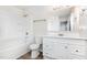 Bathroom with white vanity, tub-shower, and updated fixtures, offering a clean and modern space at 3713 Phillips W Way, Durham, NC 27713