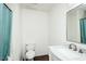 Bathroom featuring a toilet, sink, mirror, and shower with a teal curtain at 3714 Mt Zion Church Rd, Mebane, NC 27302
