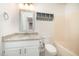 Well-lit bathroom with new countertop, fixtures and tub at 40 Crepe Myrtle Ct, Angier, NC 27501