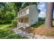 View of home showing the sidewalk leading to the covered front porch at 40 Crepe Myrtle Ct, Angier, NC 27501