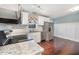 This kitchen features white cabinets, granite countertops, stainless appliances, and a stainless steel dishwasher at 40 Crepe Myrtle Ct, Angier, NC 27501