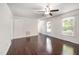 Bright living room with hardwood floors and a ceiling fan at 40 Crepe Myrtle Ct, Angier, NC 27501