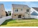 Rear view of the home with a nice pergola covered patio at 4109 Massey Preserve Trl, Raleigh, NC 27616