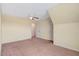Bedroom with neutral carpet, ceiling fan, and a view of the door at 4109 Massey Preserve Trl, Raleigh, NC 27616