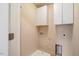 Laundry room with built in upper cabinets at 4109 Massey Preserve Trl, Raleigh, NC 27616