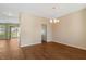 Spacious living room features hardwood floors and modern lighting at 4109 Massey Preserve Trl, Raleigh, NC 27616