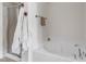 Clean bathroom featuring a shower and a soaking tub at 416 Durants Neck Ln, Morrisville, NC 27560