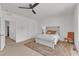 Inviting bedroom showcasing neutral walls, a ceiling fan, and a cozy area rug at 416 Durants Neck Ln, Morrisville, NC 27560
