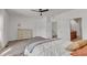 Spacious bedroom boasts neutral tones, plush carpeting, and access to the bathroom at 416 Durants Neck Ln, Morrisville, NC 27560