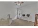Bedroom with plush carpeting, a ceiling fan, and a comfortable seating area at 416 Durants Neck Ln, Morrisville, NC 27560