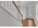 Welcoming entryway with hardwood floors and a staircase leading to the upper level at 416 Durants Neck Ln, Morrisville, NC 27560