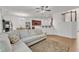 Open-concept living room boasts hardwood floors, neutral tones, and plenty of natural light at 416 Durants Neck Ln, Morrisville, NC 27560