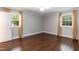 Bedroom with hardwood floors and windows that provide plenty of natural light at 4221 River Run Dr, Sanford, NC 27332