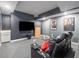 Cozy basement featuring a large television, comfortable seating, and neutral color palette at 445 Ridge Springs Dr, Chapel Hill, NC 27516