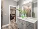 Bright bathroom featuring a stylish vanity with granite countertop and decorative vase at 445 Ridge Springs Dr, Chapel Hill, NC 27516