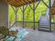 Outdoor deck area with seating and stairs leading down at 445 Ridge Springs Dr, Chapel Hill, NC 27516