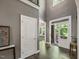 Welcoming foyer with hardwood floors, high ceilings, and an abundance of natural light at 445 Ridge Springs Dr, Chapel Hill, NC 27516