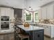 This kitchen is bright and airy with a large island, and stainless steel appliances at 445 Ridge Springs Dr, Chapel Hill, NC 27516