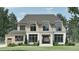 Stunning two-story home with a brick facade, elegant windows, and manicured landscaping at 4500 Latimer Rd, Raleigh, NC 27609