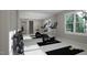 Home gym with stationary bikes and weights at 4500 Latimer Rd, Raleigh, NC 27609