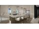 Modern kitchen featuring stainless steel appliances and large central island at 4500 Latimer Rd, Raleigh, NC 27609