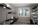 Comfortable home office featuring a modern desk and open shelving at 4500 Latimer Rd, Raleigh, NC 27609