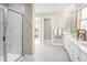 Bright bathroom showcasing a glass shower, double sink vanity, with great lighting and an open layout at 488 Freedom Trail Dr, Angier, NC 27592