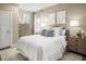 Inviting bedroom with a plush bed, coordinating nightstands, and soft neutral tones creating a peaceful ambiance at 488 Freedom Trail Dr, Angier, NC 27592