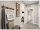 Inviting home hallway featuring a charming bench, a coat rack and attractive wall decor at 488 Freedom Trail Dr, Angier, NC 27592