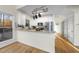 Well-lit kitchen featuring granite countertops, stainless steel appliances, and ample storage at 50 Tyler Ct, Henderson, NC 27537