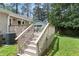 Inviting deck with railings and stairs, perfect for outdoor entertaining and relaxation at 509 E Millbrook Rd, Raleigh, NC 27609
