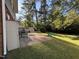 Enjoy this home's brick patio, wood deck, and ample backyard space surrounded by mature trees at 509 E Millbrook Rd, Raleigh, NC 27609