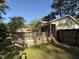 The home features a spacious deck overlooking the yard, perfect for relaxation and entertaining guests at 509 E Millbrook Rd, Raleigh, NC 27609