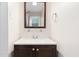 Cozy bathroom with vanity, mirror, and stylish fixtures at 509 E Millbrook Rd, Raleigh, NC 27609